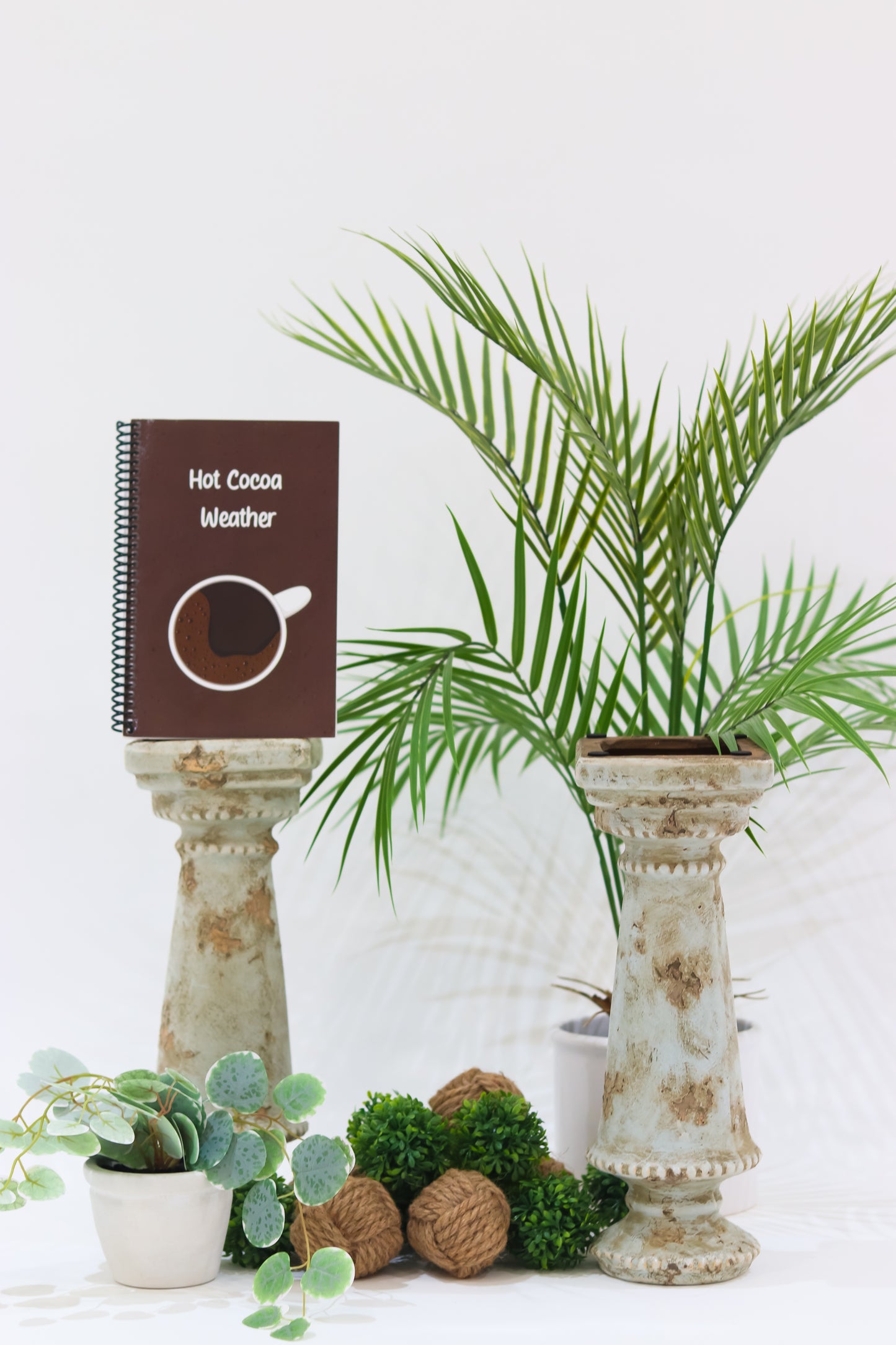 Brown spiral coiled notebook displayed